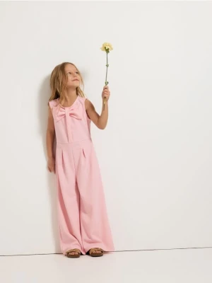 Reserved - Kombinezon z kokardą - pastelowy róż