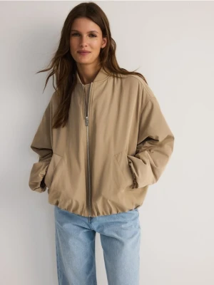 Reserved - Kurtka bomberka oversize - beżowy