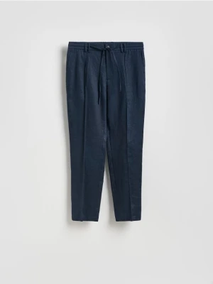 Reserved - Lniane spodnie jogger - granatowy