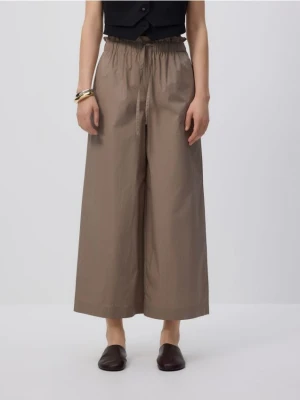 Reserved - Luźne spodnie - beżowy