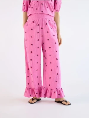 Reserved - Luźne spodnie z falbankami - różowy