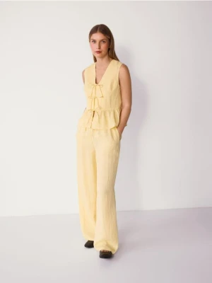 Reserved - Luźne spodnie z lyocellem - jasnożółty