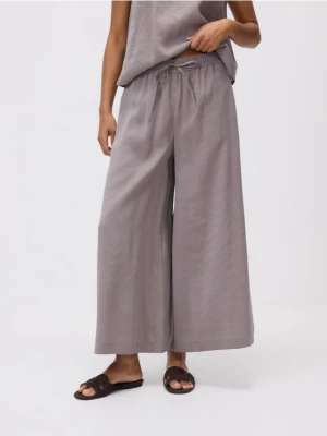 Reserved - Luźne spodnie z modalem - beżowy