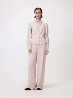 Reserved - Luźne spodnie z modalem - pastelowy róż
