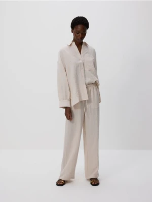 Reserved - Luźne spodnie z wiskozą - beżowy