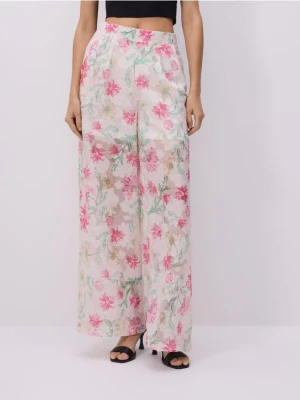 Reserved - Luźne spodnie z żakardowym wzorem - wielobarwny