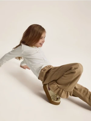 Reserved - Materiałowe spodnie z łańcuszkiem - beżowy