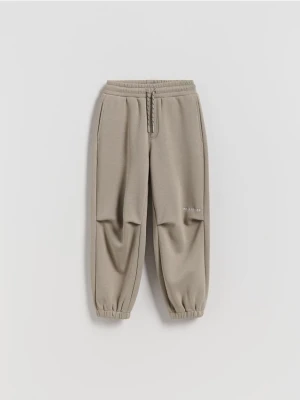 Zdjęcie produktu Reserved - Ocieplane joggery - jasnoszary