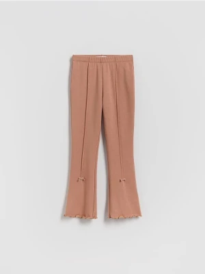 Reserved - Ocieplane legginsy flare z kokardkami - brązowy