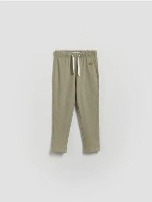 Reserved - Prążkowane legginsy - oliwkowy