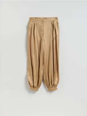 Reserved - Spodnie balloon z zakładkami - bursztynowy