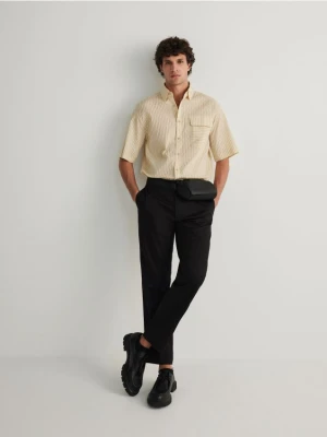 Reserved - Spodnie chino leisure fit - czarny