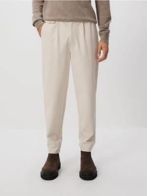 Reserved - Spodnie chino regular fit - beżowy