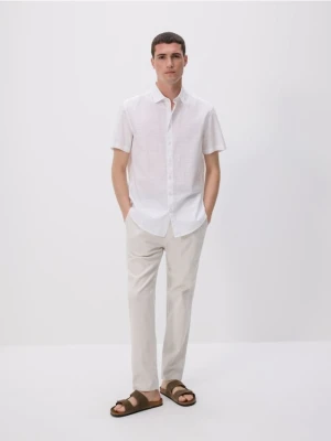 Reserved - Spodnie chino slim - beżowy