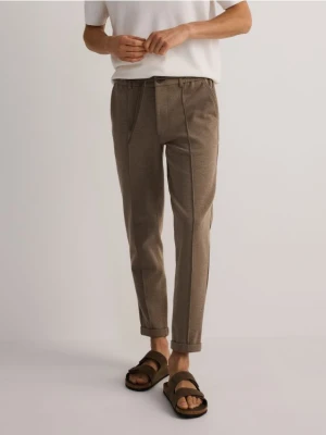Zdjęcie produktu Reserved - Spodnie chino slim - beżowy