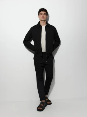 Reserved - Spodnie chino slim - czarny