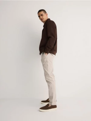 Reserved - Spodnie chino slim fit - beżowy