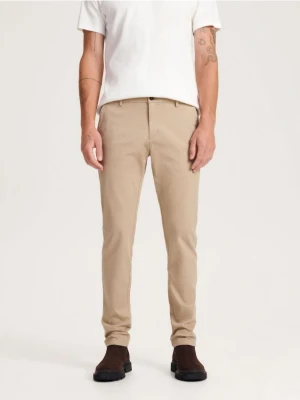 Zdjęcie produktu Reserved - Spodnie chino slim fit - beżowy