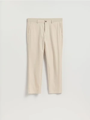Reserved - Spodnie chino slim fit - beżowy