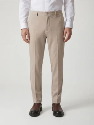 Reserved - Spodnie chino slim fit - beżowy