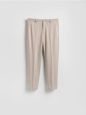 Reserved - Spodnie chino slim fit - beżowy