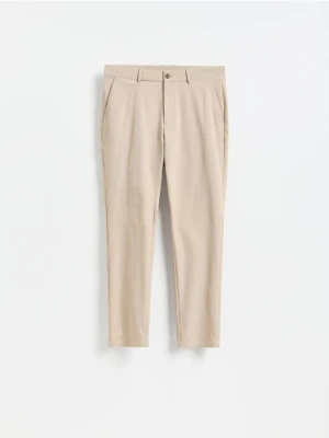 Reserved - Spodnie chino slim fit - beżowy