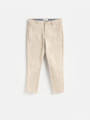 Reserved - Spodnie chino slim fit - beżowy