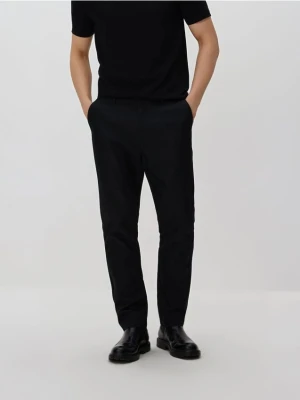 Reserved - Spodnie chino slim fit - czarny