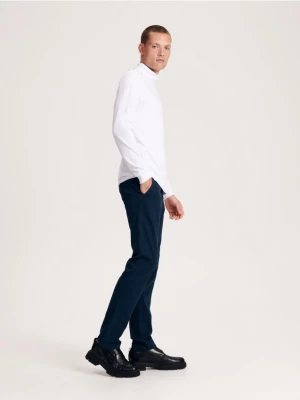 Reserved - Spodnie chino slim fit - granatowy