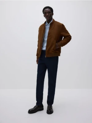 Reserved - Spodnie chino slim fit - granatowy