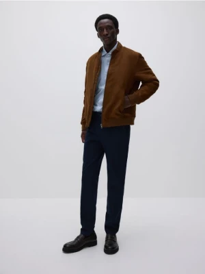 Reserved - Spodnie chino slim fit - granatowy
