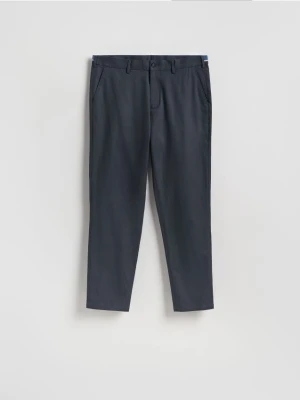 Reserved - Spodnie chino slim fit - granatowy