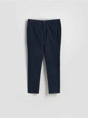 Reserved - Spodnie chino slim fit - granatowy