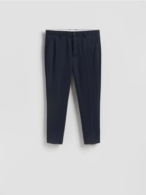 Reserved - Spodnie chino slim fit - granatowy