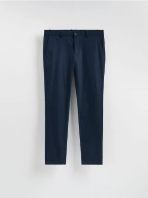 Reserved - Spodnie chino slim fit - granatowy