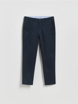 Reserved - Spodnie chino slim fit - granatowy
