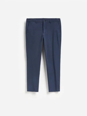 Reserved - Spodnie chino slim fit - granatowy