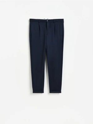 Reserved - Spodnie chino slim fit - granatowy