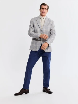 Reserved - Spodnie chino slim fit - niebieski