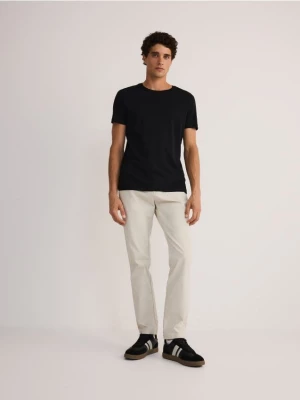 Reserved - Spodnie chino slim fit - złamana biel