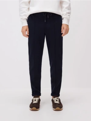 Reserved - Spodnie chino slim - granatowy