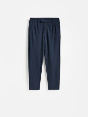 Reserved - Spodnie chino slim - granatowy