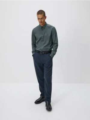 Reserved - Spodnie chino slim z wiskozą - granatowy