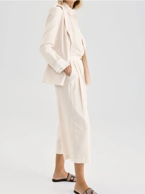 Reserved - Spodnie culotte z lnem - beżowy