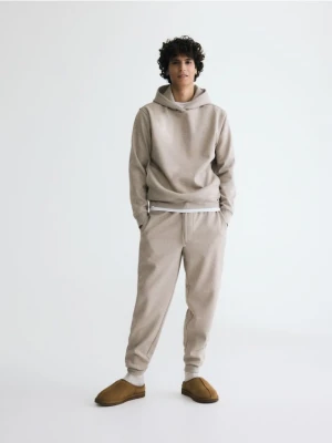 Reserved - Spodnie dresowe regular fit - beżowy