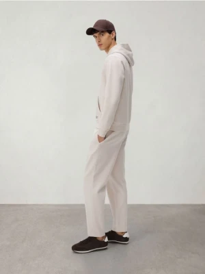 Reserved - Spodnie dresowe regular fit - beżowy