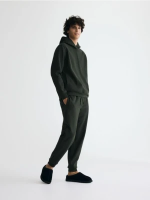 Reserved - Spodnie dresowe regular fit - ciemnozielony