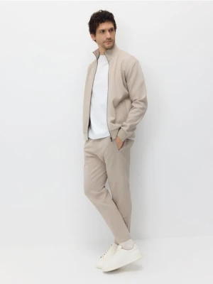 Reserved - Spodnie dresowe slim - beżowy
