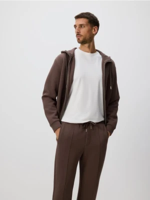 Reserved - Spodnie dresowe slim fit - beżowy