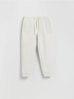 Reserved - Spodnie dresowe slim fit - złamana biel